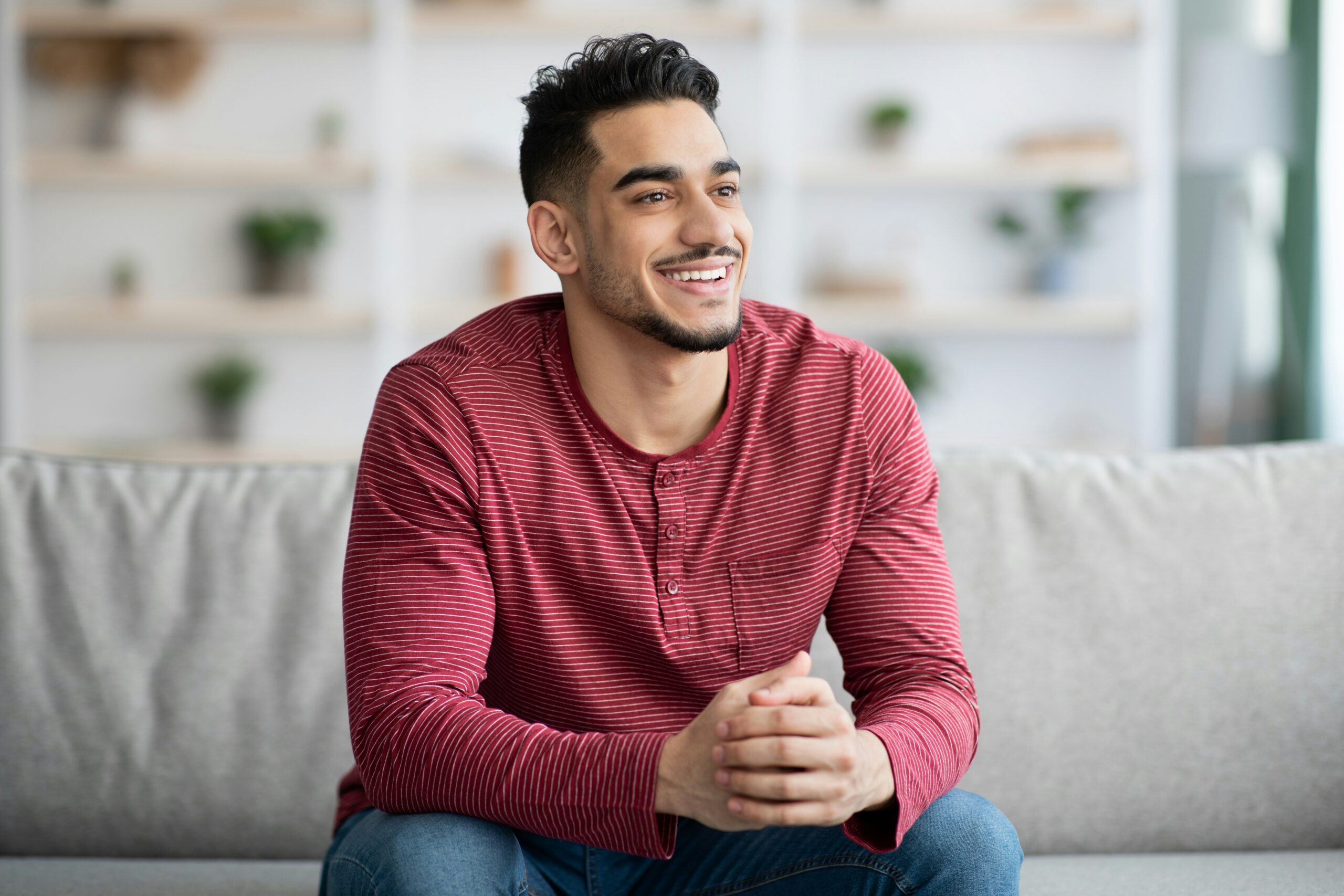 A man showcasing the confidence and natural-looking results following a successful Sylfirm X hair restoration treatment plan.